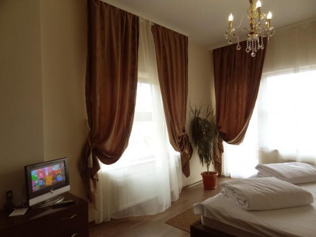Ave Hotel Victoriei Bucareste Quarto foto
